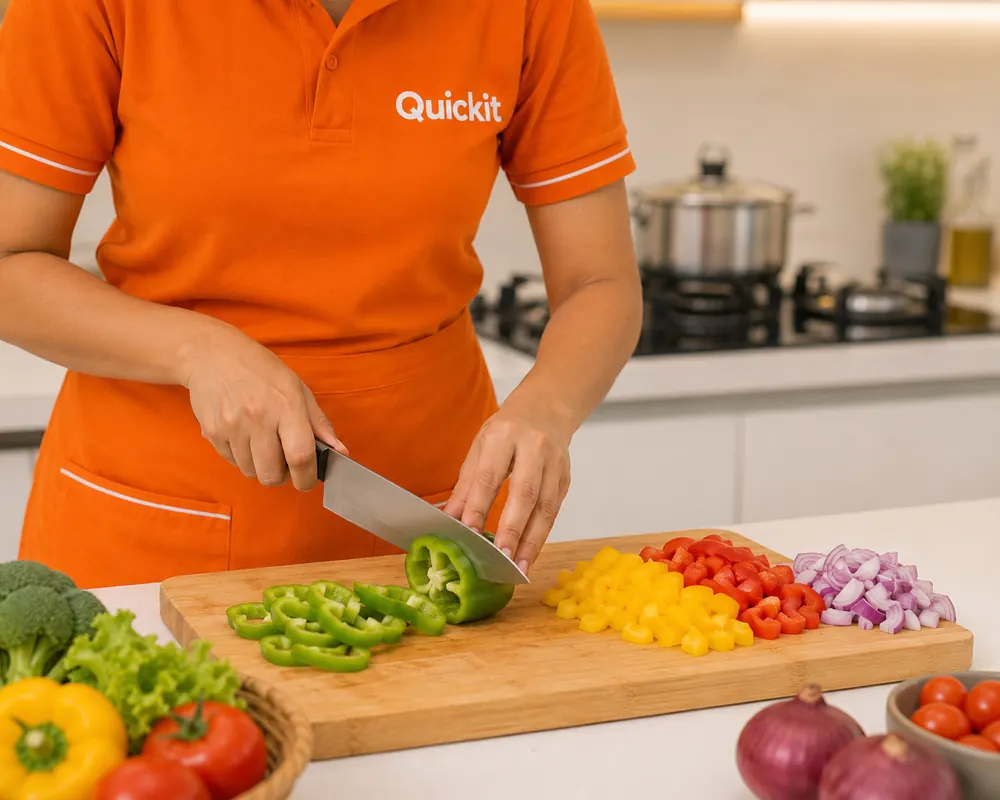 Quickit partner preparing vegetables in a kitchen
